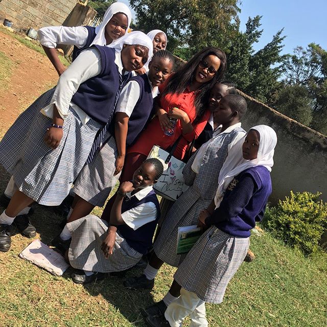 Corazon Kwamboka with Highway high school girls