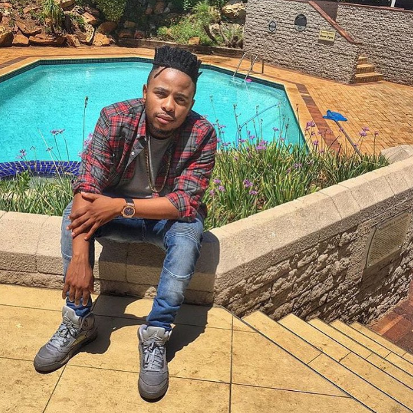 L-Tido rocking Air Jordan 5 Wolf Grey sneakers