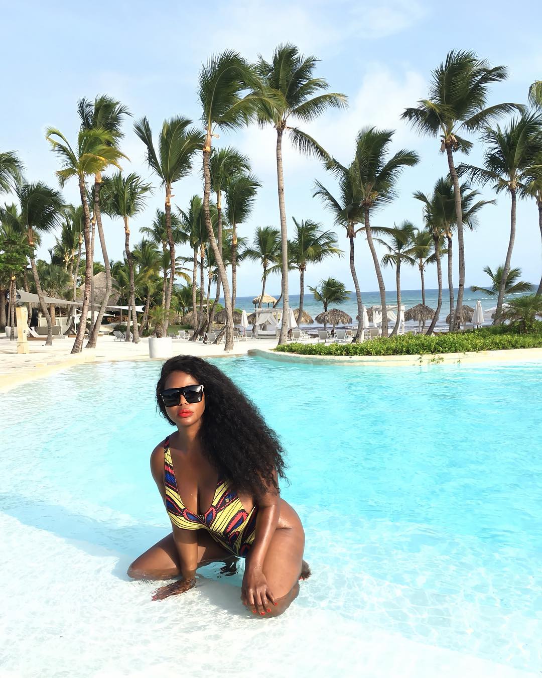 Buhle Mkhize vacationing in Eden Roc at Cap Cana. Photo credit: Instagram/booslay_