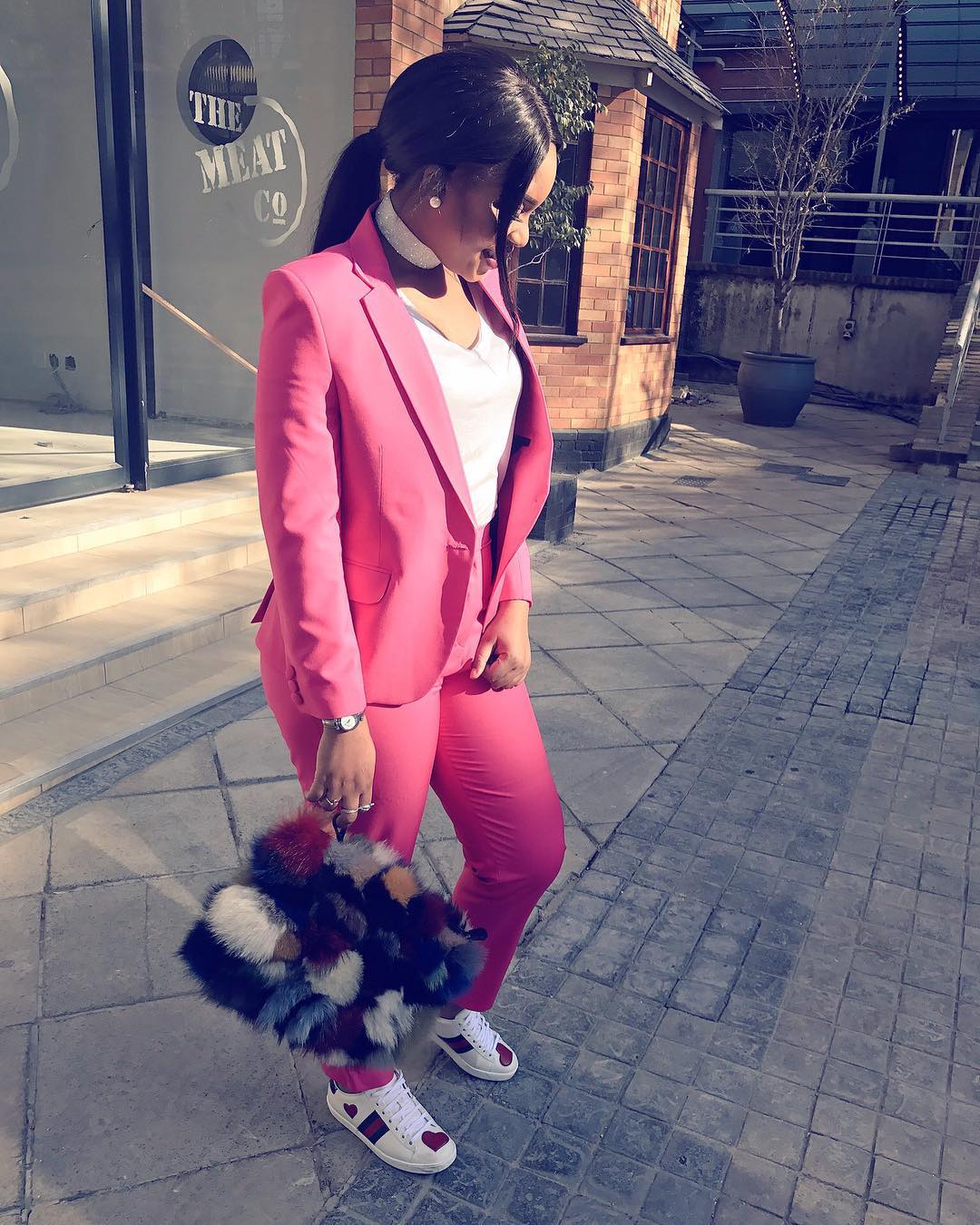 Jokate Mwegelo wearing Gucci sneakers. photo credit: Trevor Zondi
