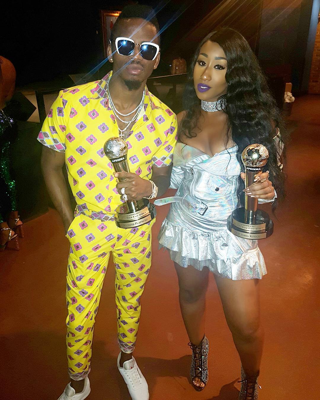 Victoria Kimani and Diamond Platnumz pose with their awards