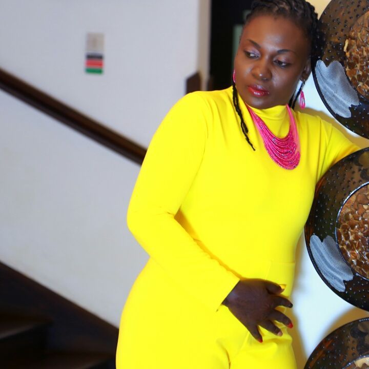 Nyota Ndogo in yellow dress