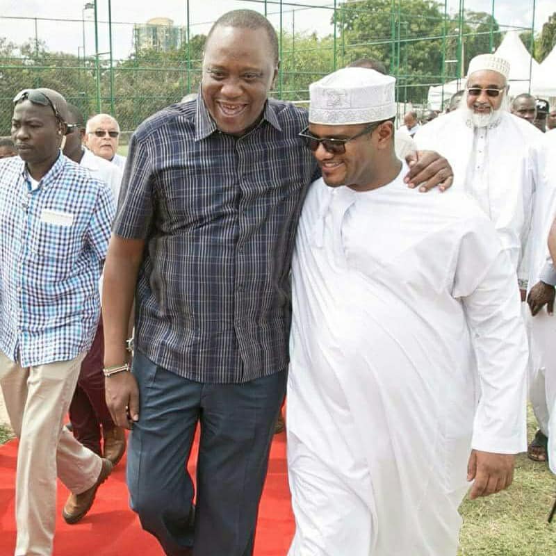 Hassan Omar with Uhuru Kenyatta after he defected from Nasa