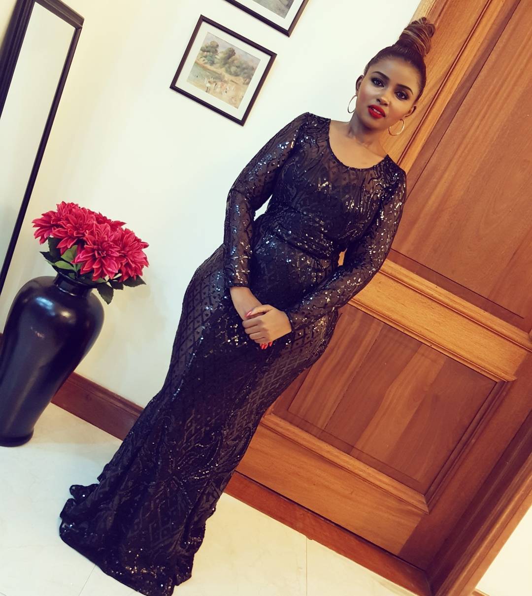 Anerlisa Muigai in black dress