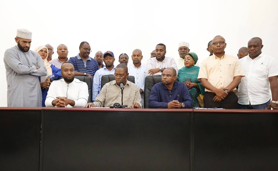 Coast leaders leaders addressing the press.