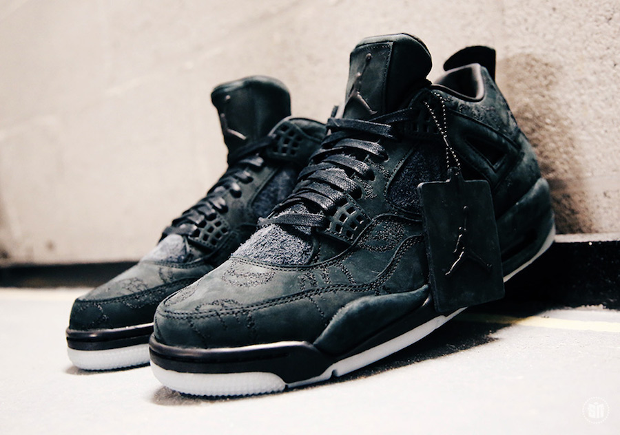 KAWS x Air Jordan 4 Black sneakers. photo credit: Sneaker News