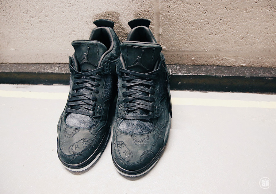 KAWS x Air Jordan 4 Black sneakers. photo credit: Sneaker News