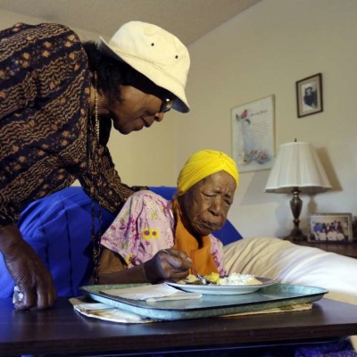 Photos: madness in Bungoma as man hangs on helicopter carrying Jacob Juma’s body