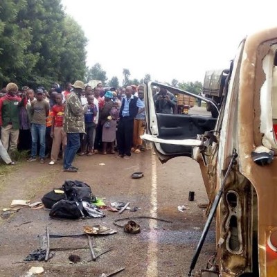 Kenyans React As Rare Photo Of President Uhuru Kenyatta Babysitting His Son Muhoho Kenyatta Is Shared