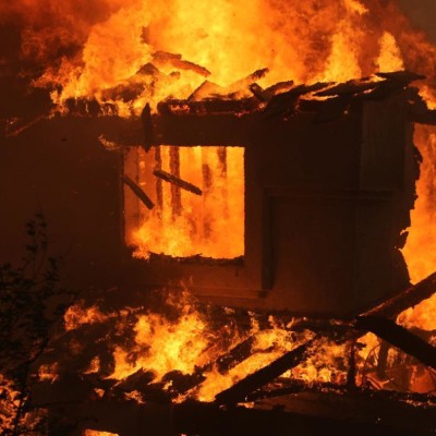 Photos:Drama As Police Spokesman Charles Owino Is Forced To Bath In Blood!