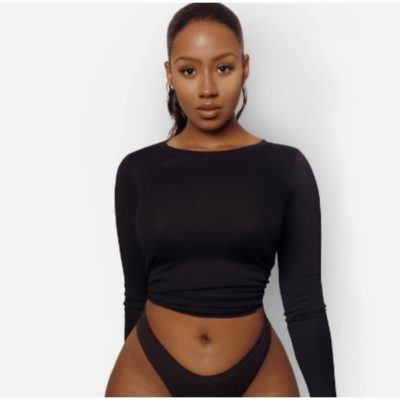 Octopizzo flaunts his sexy tattooed-body in a sexy pose