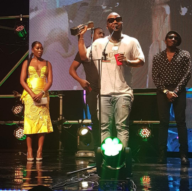 Cassper Nyovest receiving his award at the Souncity Awards 2017 in Lagos