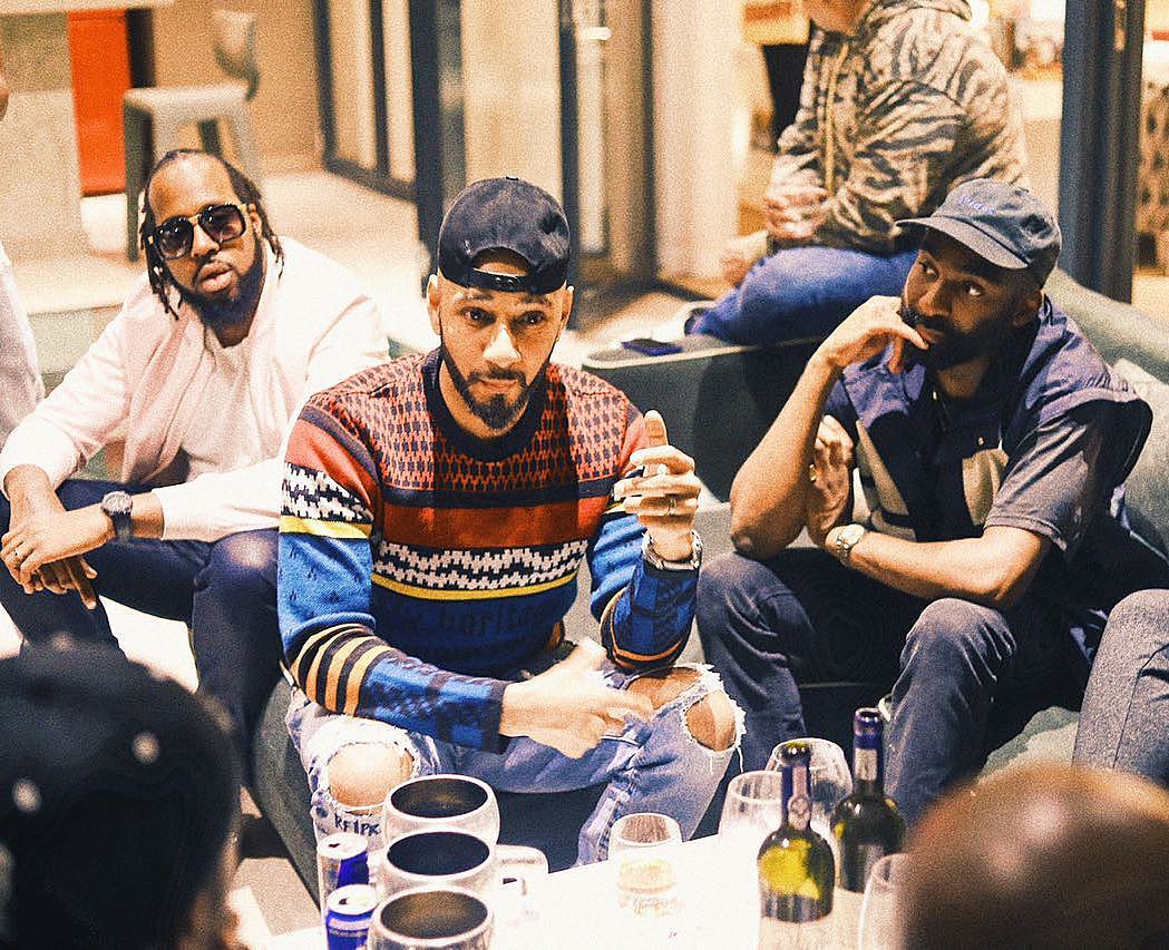 Riky Rick looking on as Swizz Beatz talks. photo credit: Instagram/rikryrickworld