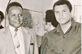 Kenneth Matiba, then Kenya's Minister for Culture and Social Services with legendary boxer Mohammed Ali