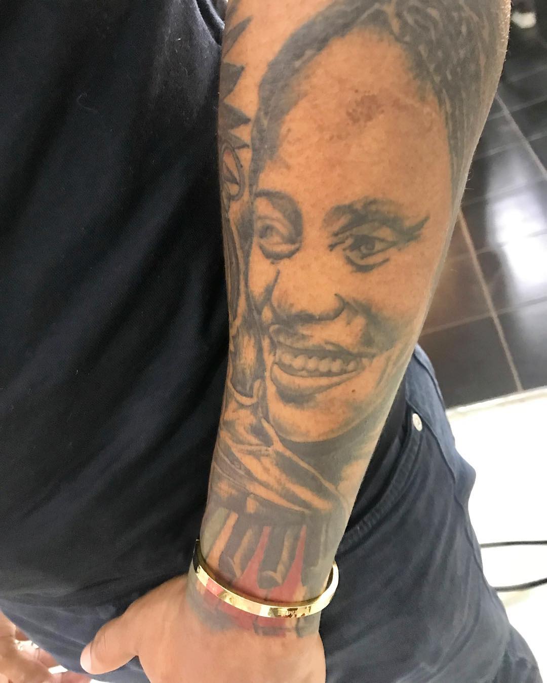 Otile Brown's arm tattoo of his mother's face. photo credit: Instagram/otilebrown