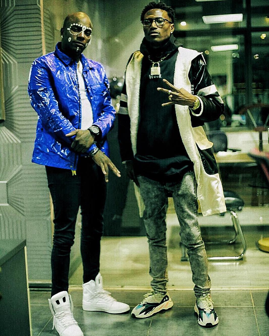 Octopizzo rocking the Adidas Yeezy Boost 700 Solid Grey/Chalk White-Core Black. photo credit: Instagram/octopizzo