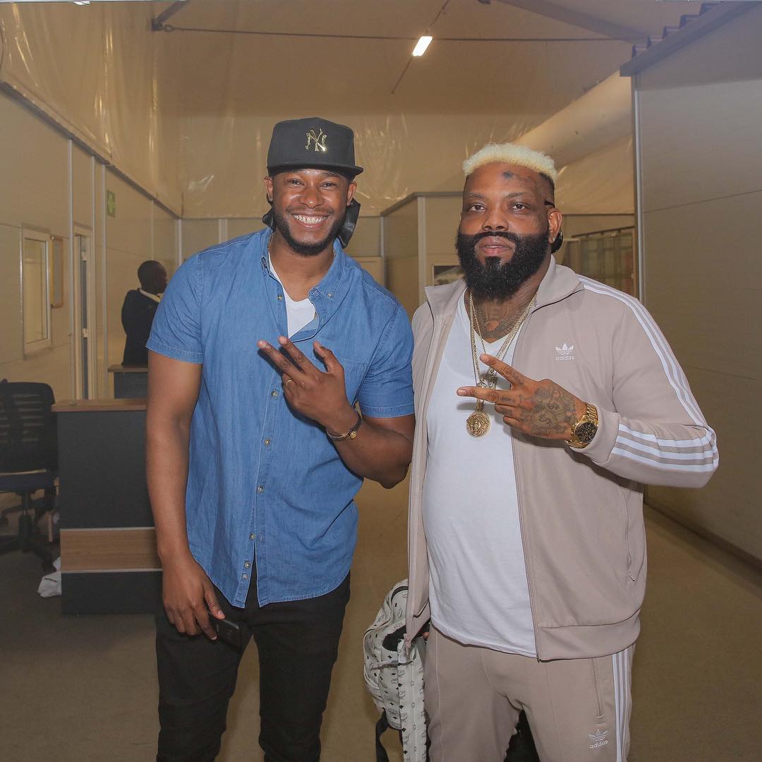 Redsan with Jamaican dancehall musician, Demarco at the airport. photo credit: Instagram/anyikopr