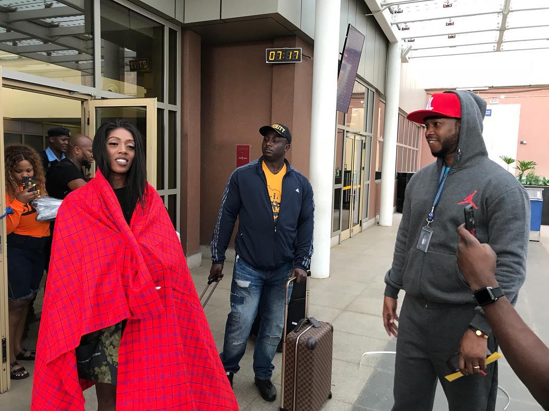 Redsan with Nigerian pop star, Tiwa Savage at the airport. photo credit: Instagram/anyikopr