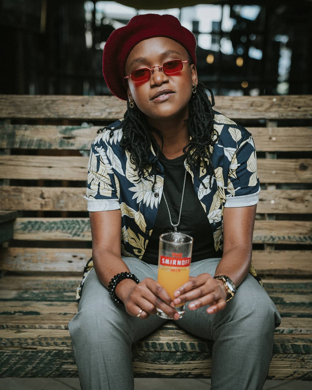 Fena Gitu posing with a glass of Smirnoff. she’s the brand ambassador for Smirnoff Kenya together with fellow rapper, Octopizzo. photo credit: Instagram/fenamenal