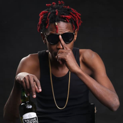 sssssmoking! Huddah Monroe enjoys a cigar with Jeff Koinange