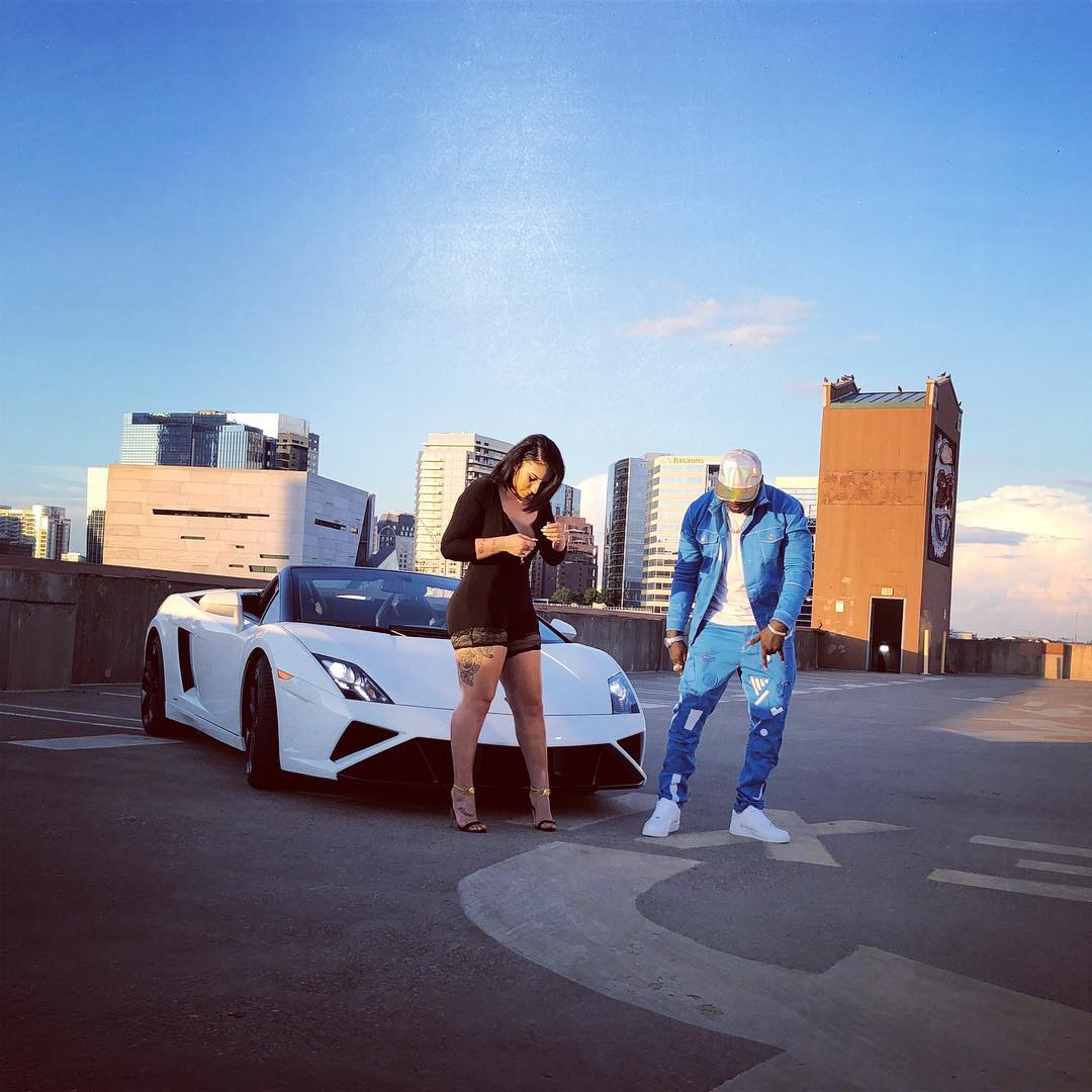 Khaligraph Jones and a model on set of the music video for 'Superman' he is shooting in Dallas spitting bars in front of a Lamborghini. photo credit: Instagram/khaligraph_jones