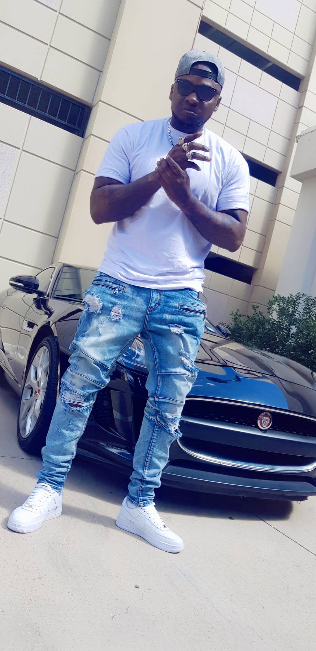 Khaligraph Jones looking fly in Dallas, Texas rocking white Air force 1 low tops. photo credit: Instagram/khaligraph_jones