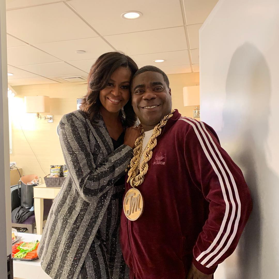 Tracy Morgan with former First Lady of United States of America rocking the same chain with his initials, "TM" that he gave King Kaka to wear on the music video for 'Royalty'. photo credit: Instagram/realtracymorgan