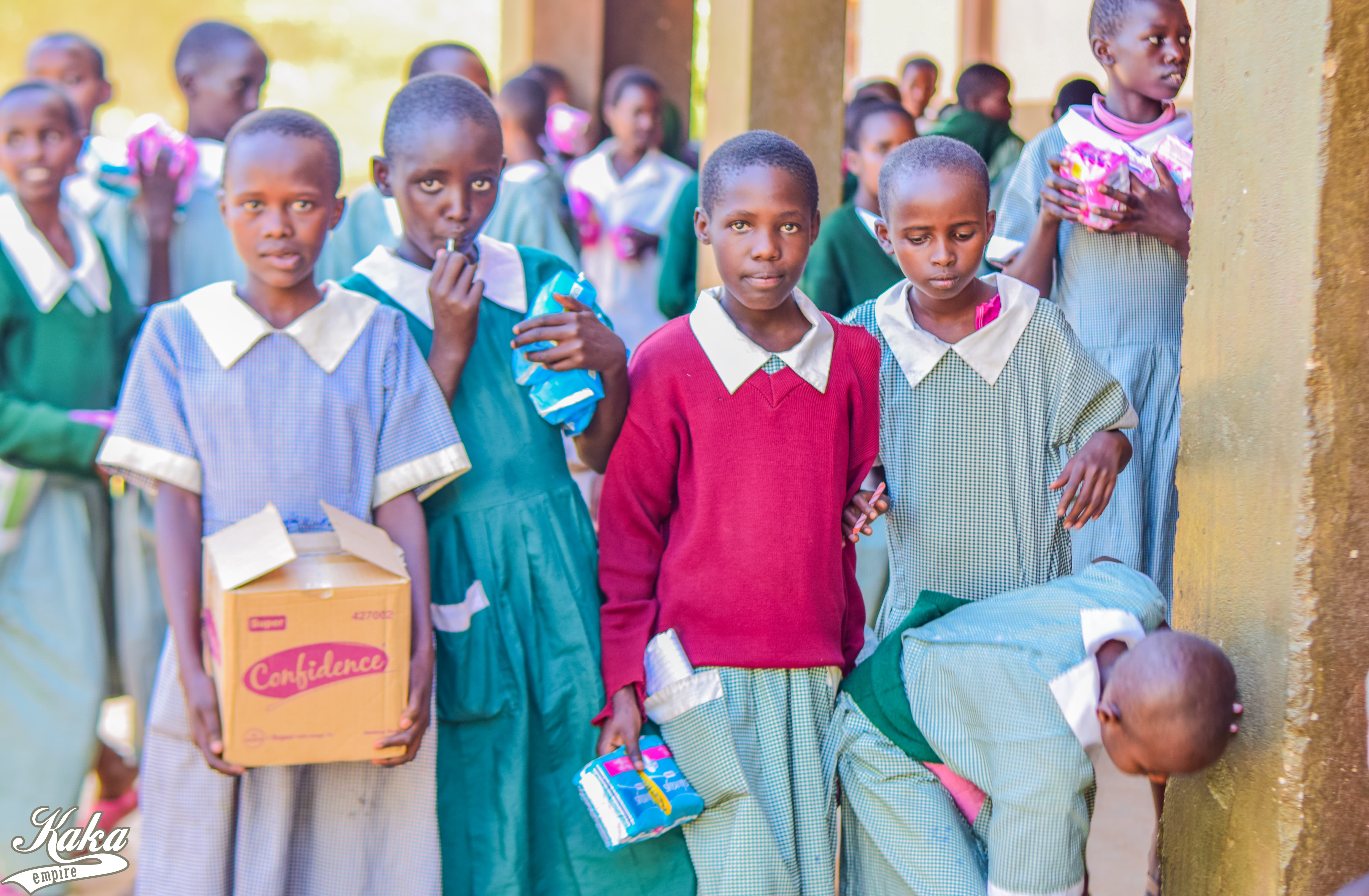 School girls at Wamba town with their Cnfidence sanitary towels-min