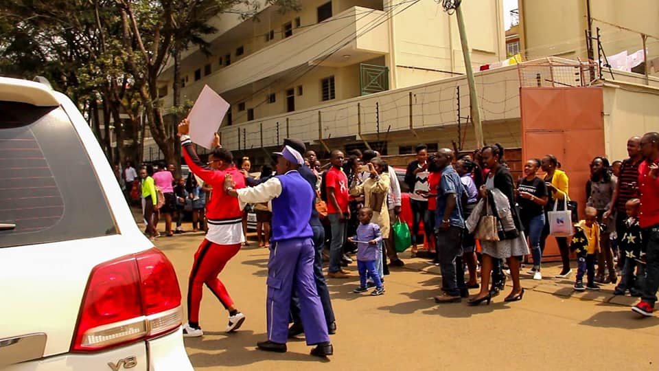 Ringtone holding his "Looking for a Wife" placard outside of Jubilee Christian Church, Parklands earlier on today. photo credit: Facebok/Ugenya Siaya Alego