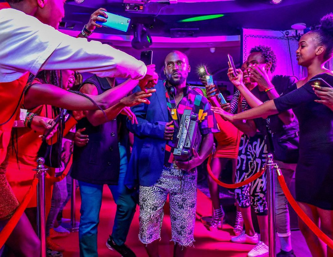 DJ Shiti on set of 'Kidesign' music video by Eddie Butita which features himself and King Kaka. photo credit: Instagram/eddiebutita