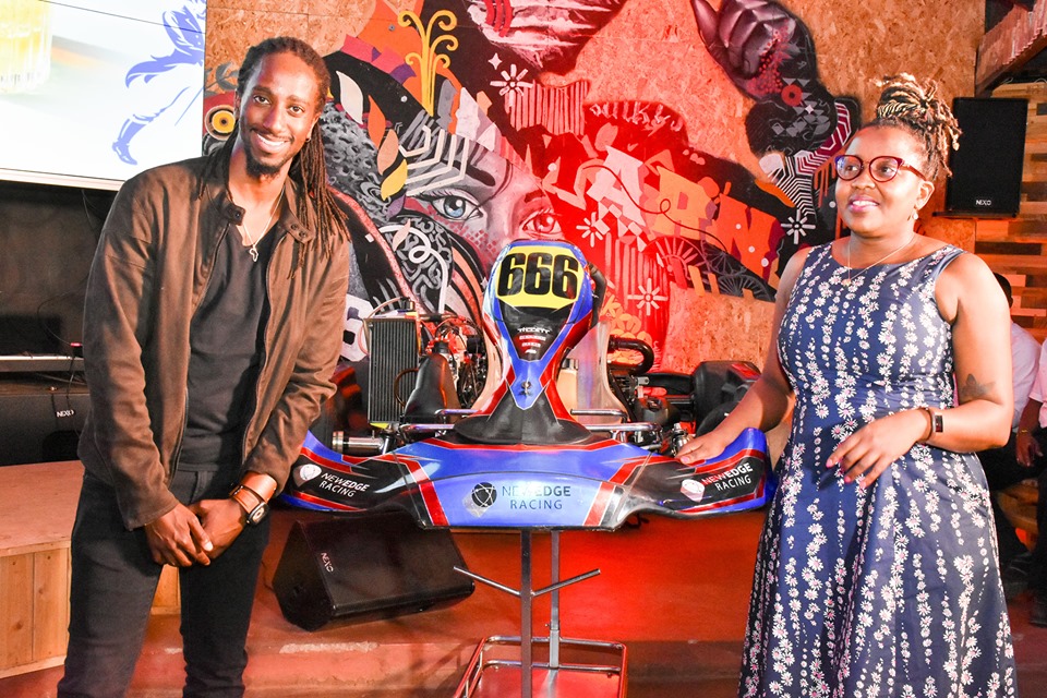 Ndegwa Kibuthu a racer with KBL’s Head of Premium Spirit, Grace Nshemeire-Gwaku during the unveil of 20 racing team for Johnnie Walker Formula 1 VR & GP Karting Championship. The winning team in the competition will win a trip to watch live Grand Prix in Abu Dhabi later in the year, courtesy of Johnnie