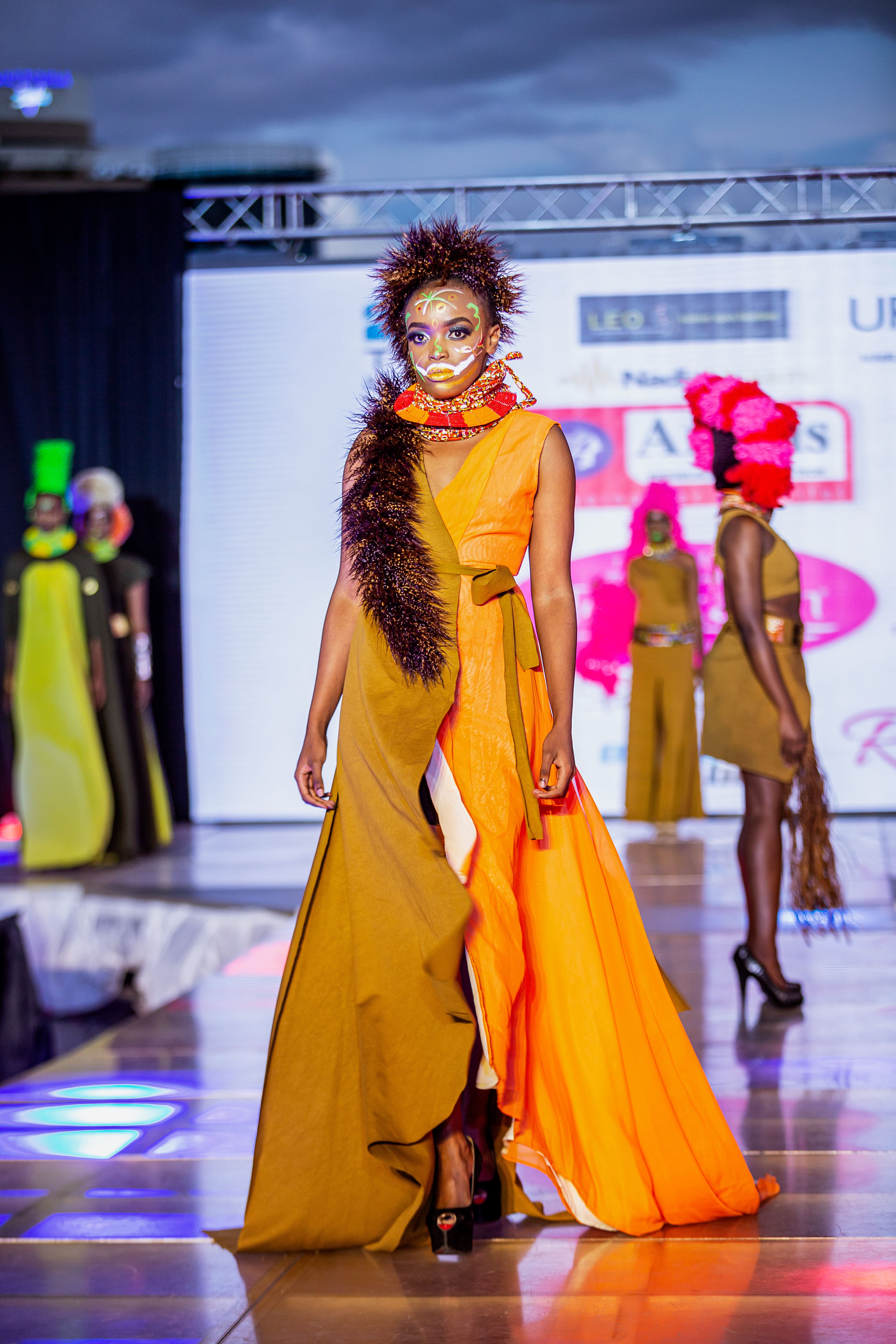 Model strutting the runway in Sally Karago's latest collection. photo credit: Laurent Bosire