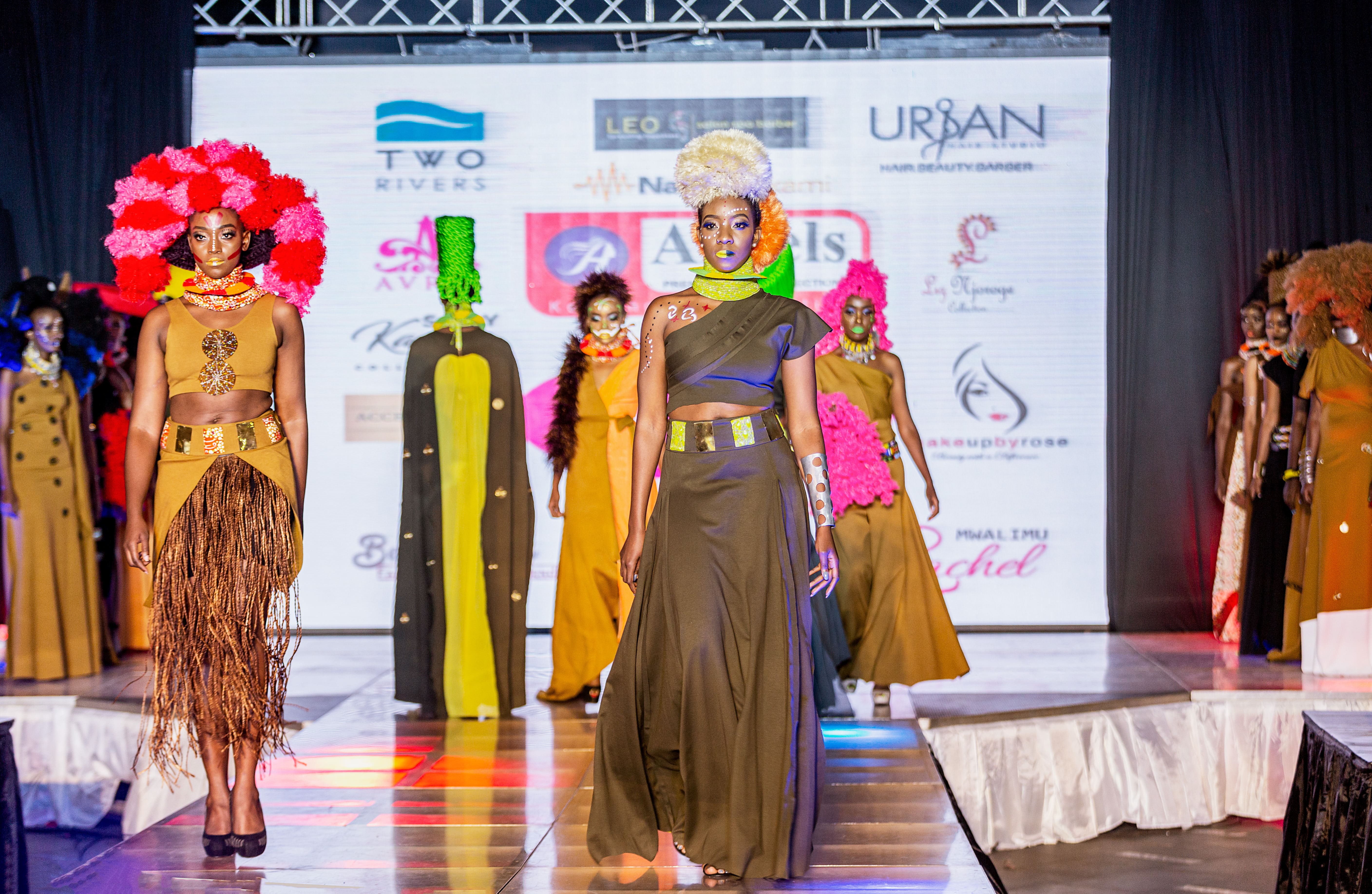 Models in Sally Karago's designs and Angel's fantasy hair designs. photo credit: Laurent Bosire