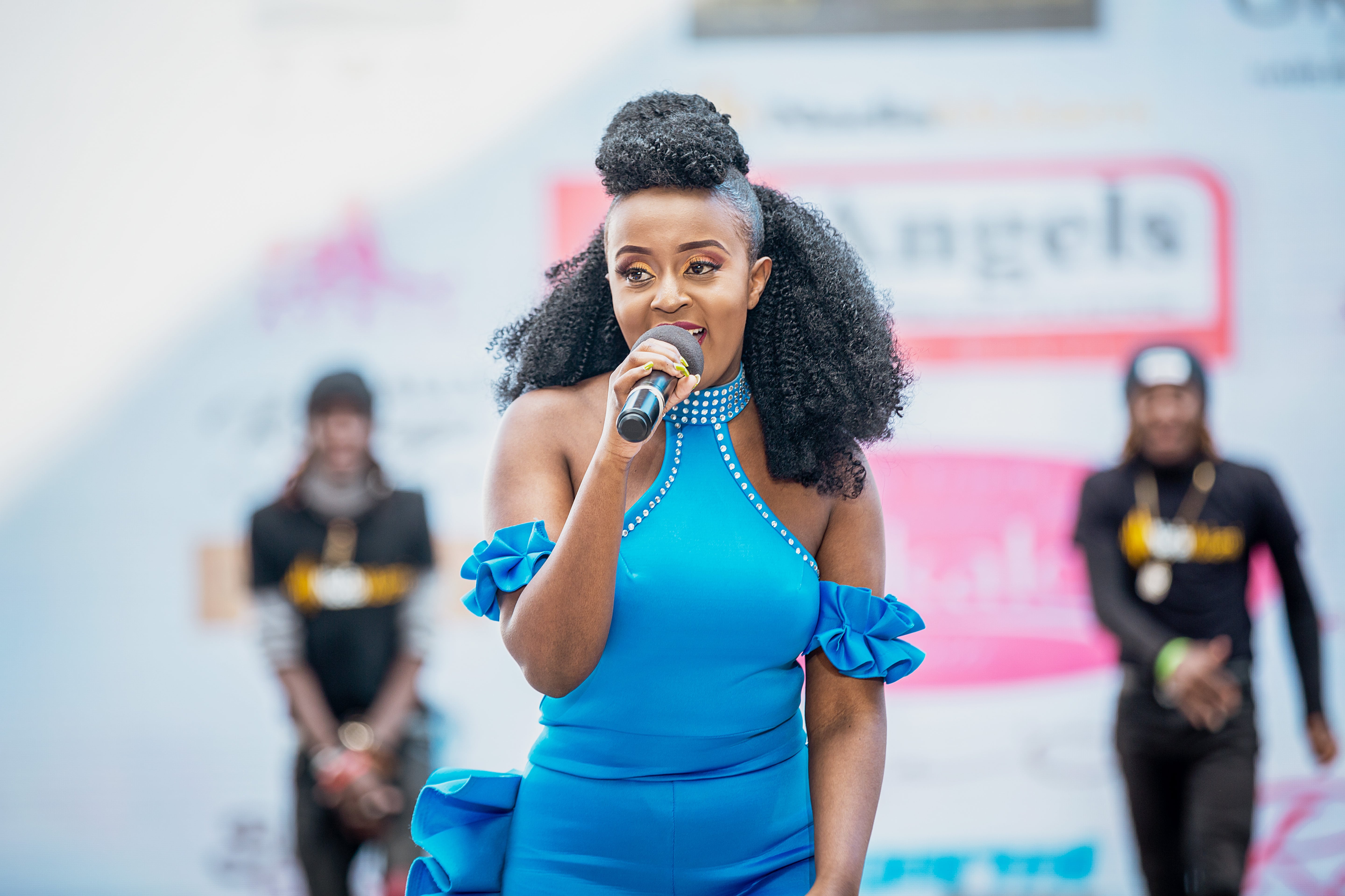 Nadia Mukami performing to the crowd in attendance. photo credit: Laurent Bosire