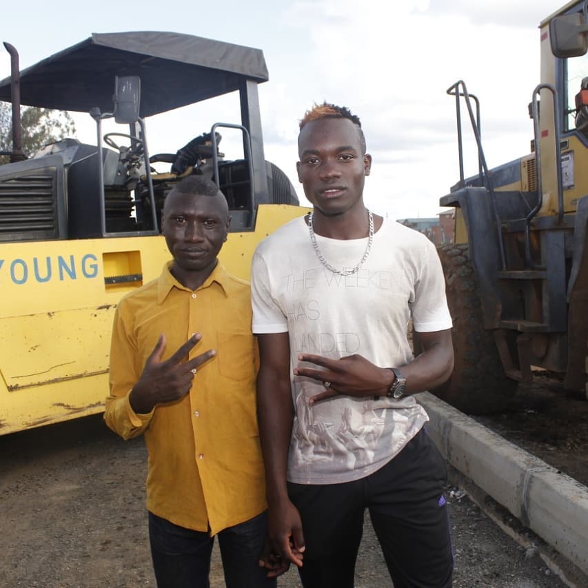 Byzzo The Baddest and Stivo Simple Boy on set of their 'Inauma' music video shoot in Kibera. The song was officially released on November 2019. Photo credit: Instagram/byzzo_the_baddest