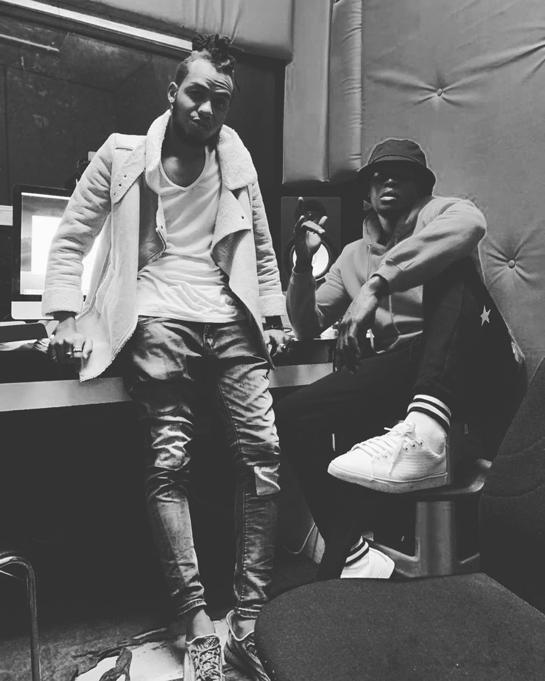 Record producer, sound engineer with Arrow Bwoy in the studio. Photo credit: Instagram/ilogosmusic