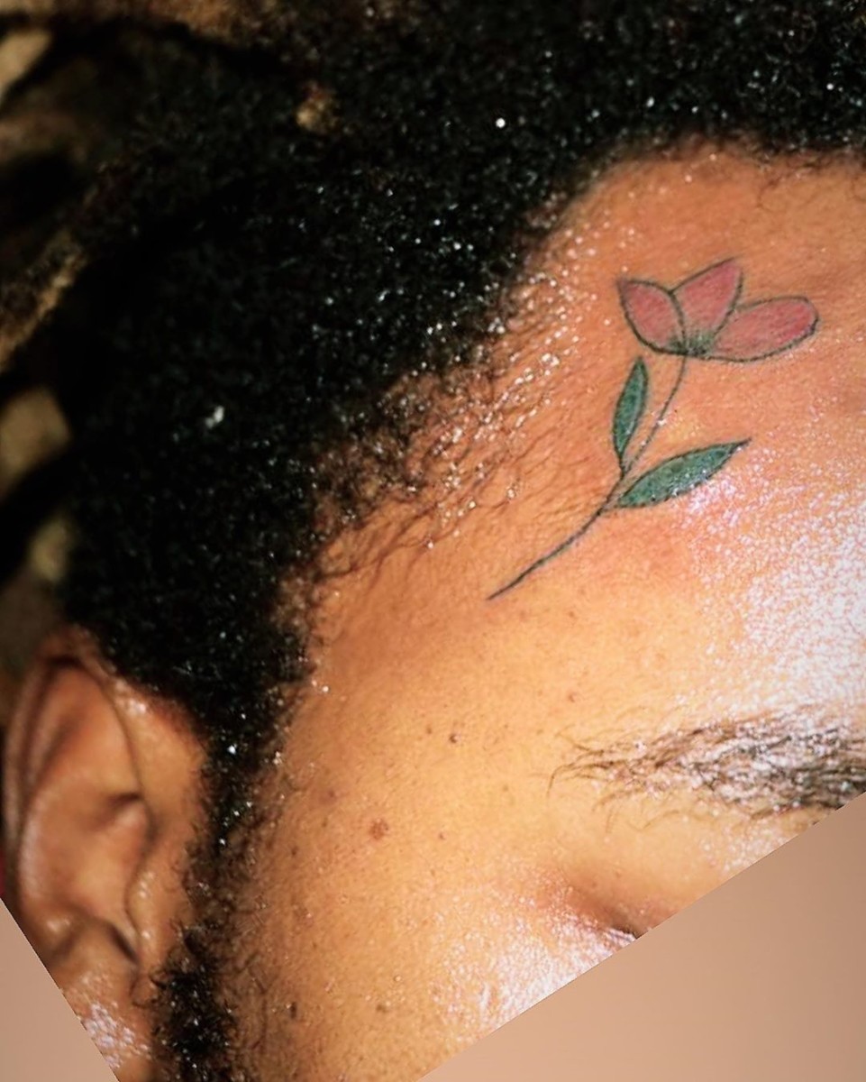Magix Enga's head tattoo. Photo credit: Instagram/magix_enga