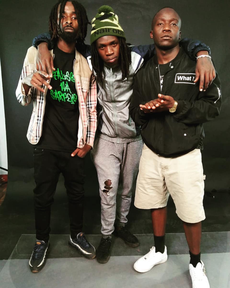 From Left to Right: Oksyde, Virusi Mbaya, and Scar on set of the 'Nganya' music video set. All of them were in the music video. Photo credit: Instagram/oksydemusik