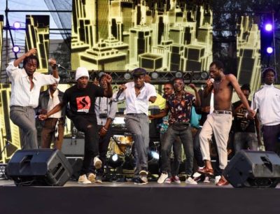 16-year-old rapper Trio Mio reports back to school accompanied by his mother