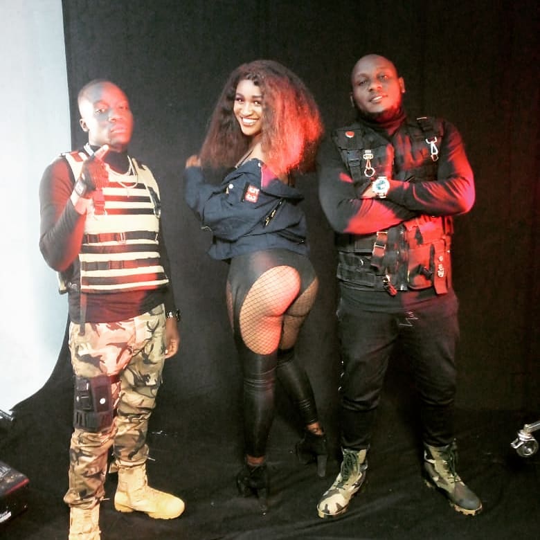 Vioxii Dede and Scar together with a model on set of 'Levels' music video shoot. Photo credit: Instagram/vioxiidede