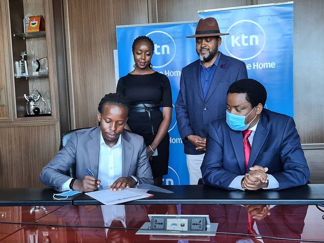 Eugene Mbugua (Left signing) Joe Munene Managing Director Broadcast Divison The Standrad Group, Actor Mwaniki Mageria with the fedora cap and Caroline Wanjiru Production Manager Foods of Kenya