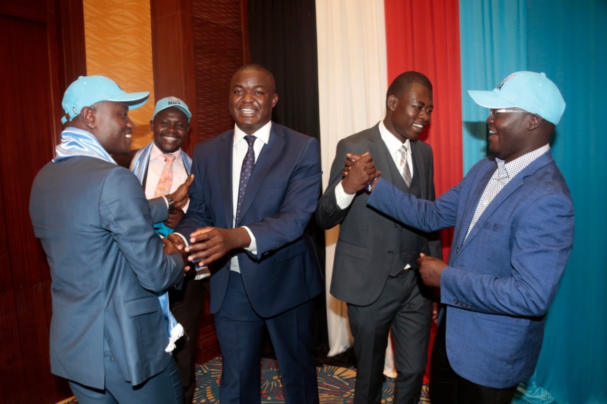NRA officials Kuchio on the far left, Rumenya, Riziki, Magufuli and Mundalo during the unveiling.
