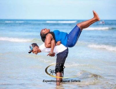 Jidenna wears YEMA apparel from a Kenyan designer from Kibera