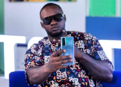 Octopizzo shows off his other tattoos apart from the rose