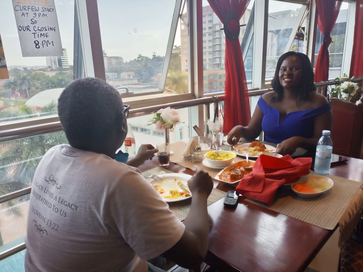 Nantongo Immaculate sharing a meal with her ex-husband. Photo credit: Facebook/Nantongo Immaculate