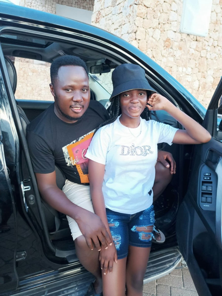 Luo music maestro Dola Kabarry with her daughter Milka Sheryl who made them proud on her new Toyota Landcruiser Prado TX. Photo credit: Facebook/Dola Kabarry