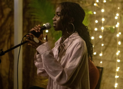 Wangechi is glad and happy to see her mural on a matatu