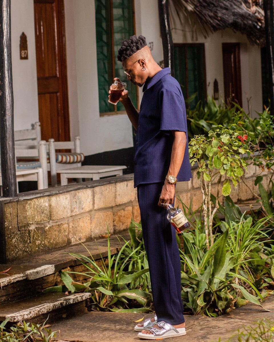 Octopizzo sipping on the Hennessy cognac. Photo credit: Instagram/octopizzo