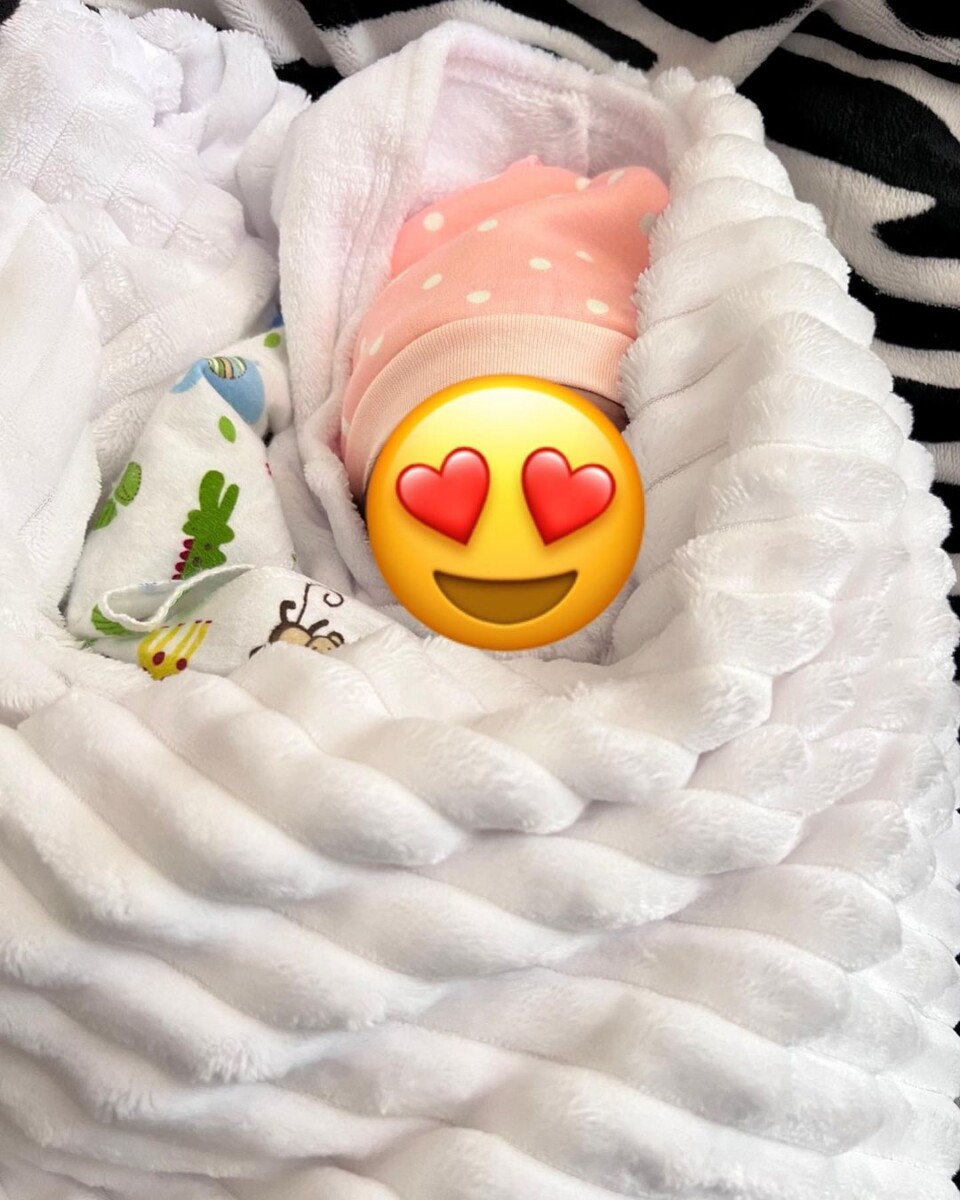 Zoey Pluto covered with 'Love eyes' emoji