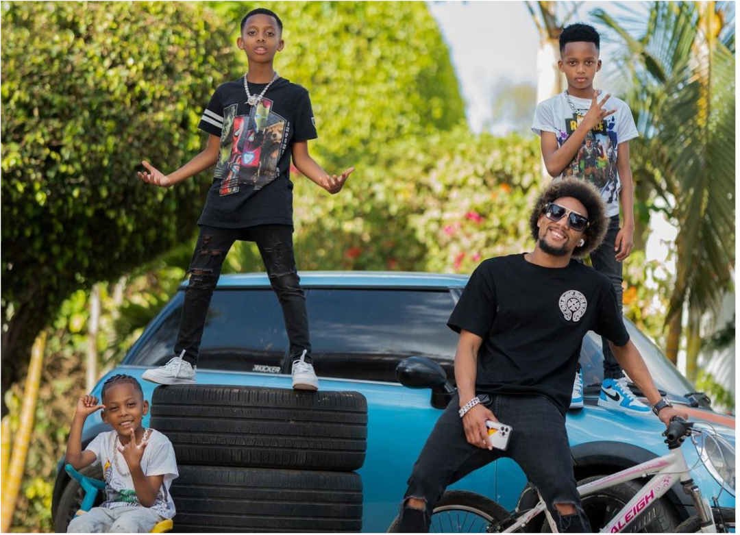 Dope photos of KRG the Don and his 3 grown boys